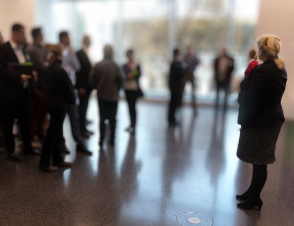 Birgit Gosejacob standing in front of a group of participants also standing, ready for the next move.